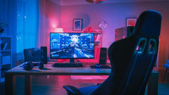 Gaming Chair with computer screen and a red/blue backgroung lighting